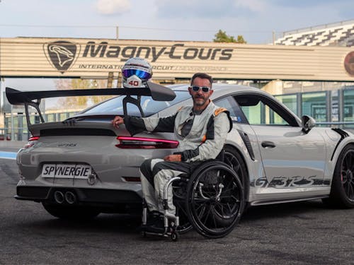 Porsche 911 GT3 RS at Magny-Cours with man in wheelchair