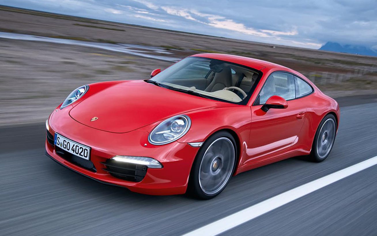Three-quarters view of Porsche 911 Turbo (type 991.1) on road