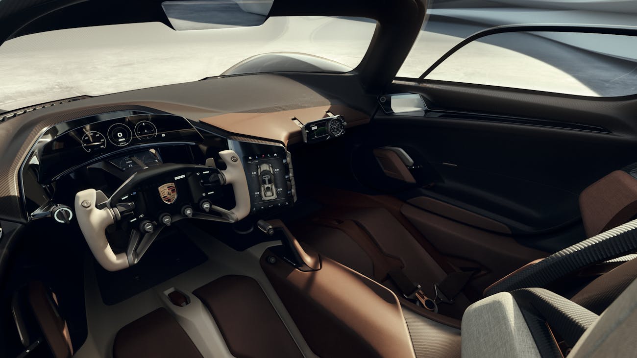 Porsche Mission X concept interior showing open-top steering wheel
