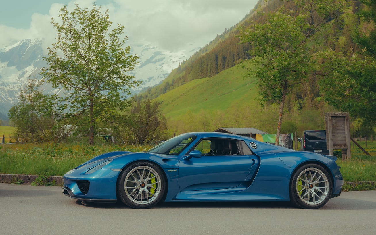 Sapphire Blue Metallic Porsche 918 Spyder at foot of Grossglockner