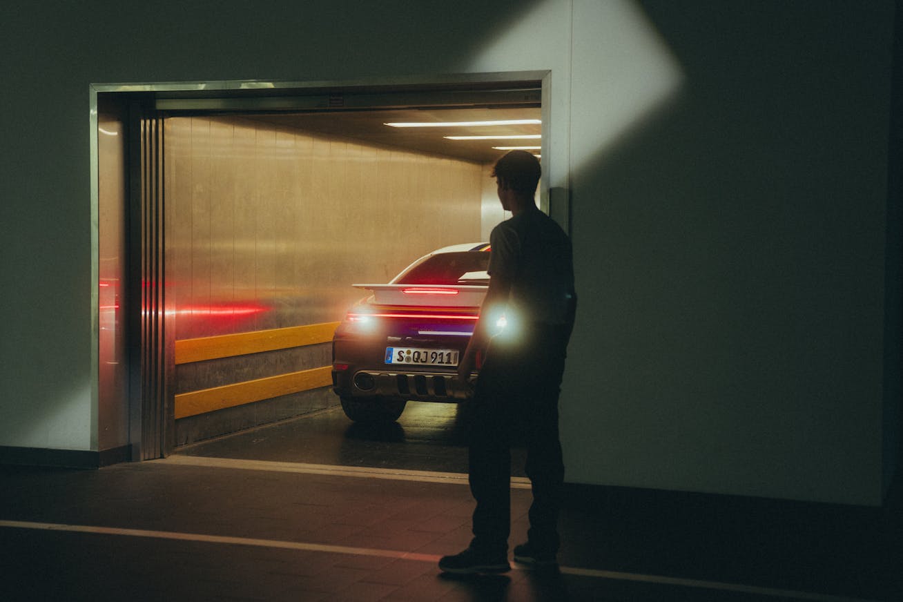 Rear of Porsche 911 Dakar in an elevator