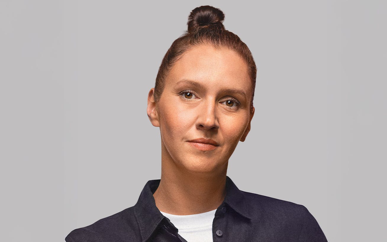Portrait photography of woman with grey studio background