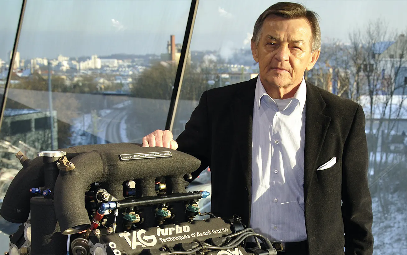 Hans Mezger next to his TAG-Porsche Turbo engine for the McLaren Formula One team 