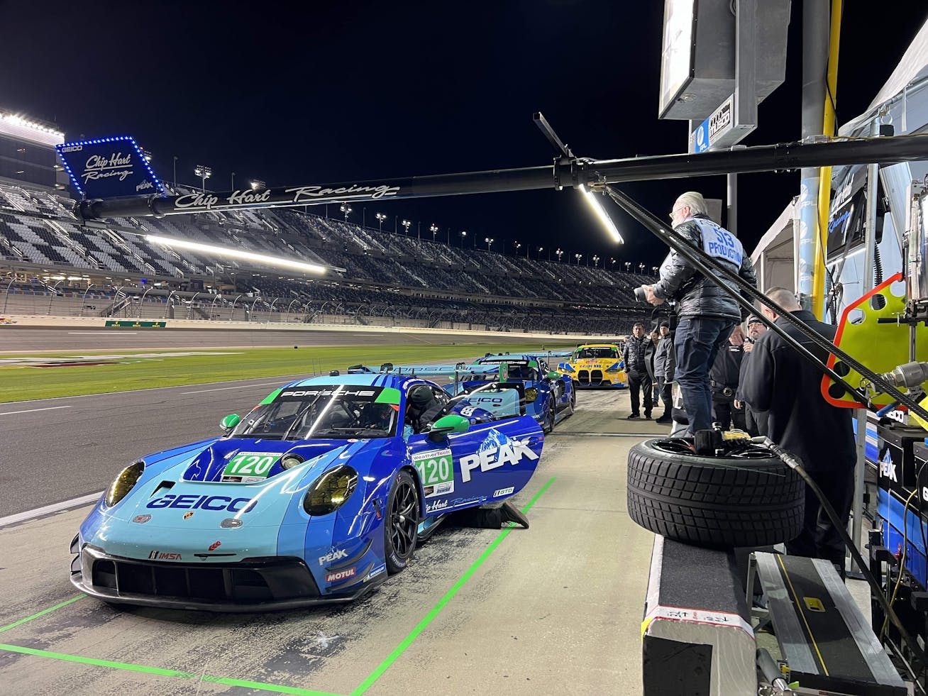 The Chip Hart Racing Porsche 911 GT3 R filming at Daytona