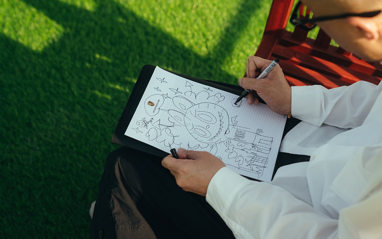 Contemporary artist Kasing Lung sketching King Mon