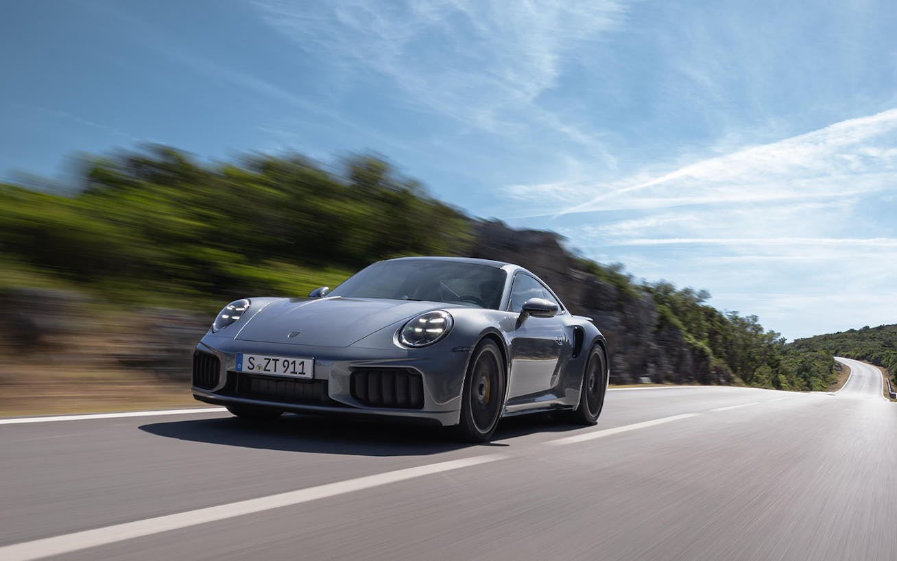 Porsche 911 Turbo S (type 992.2) driving on open road