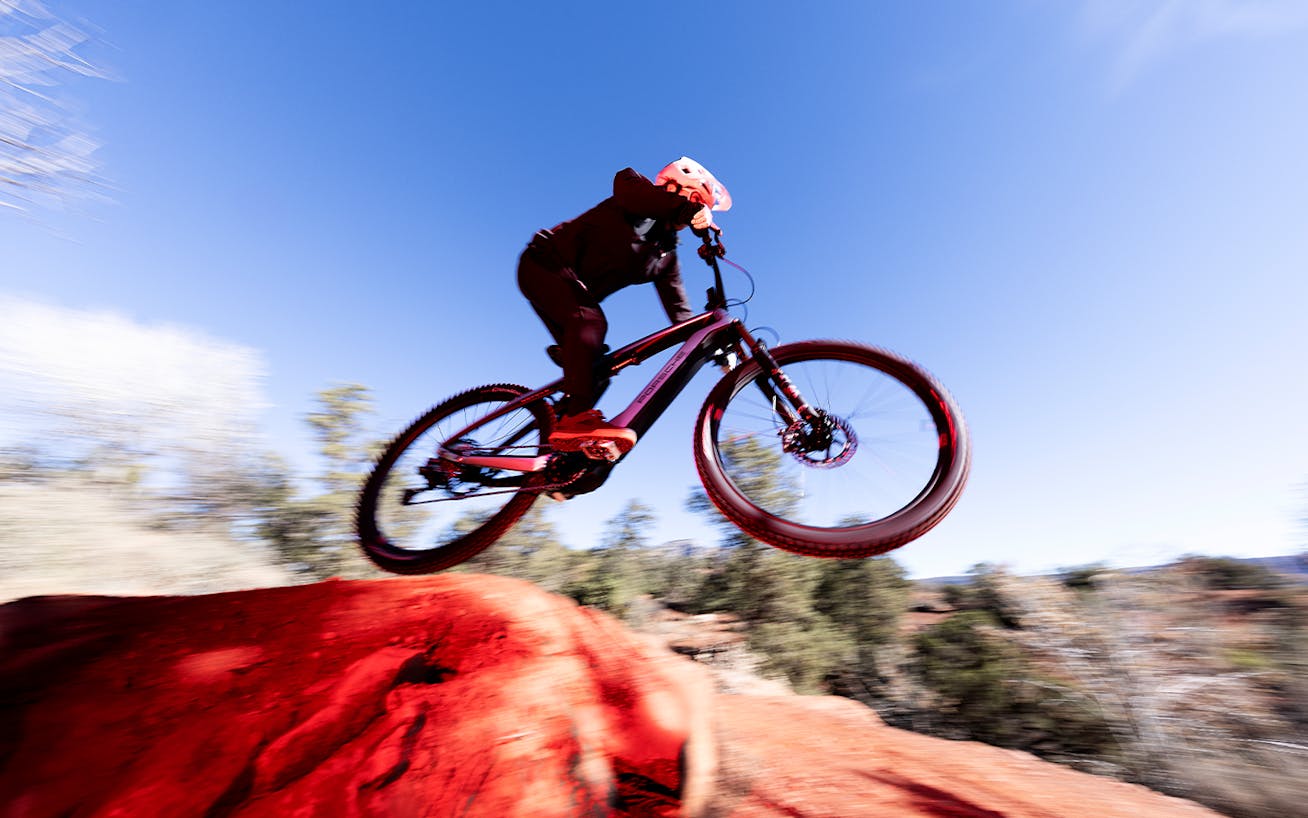 Mountain biker on Porsche eBike Cross Performance in Arizona desert