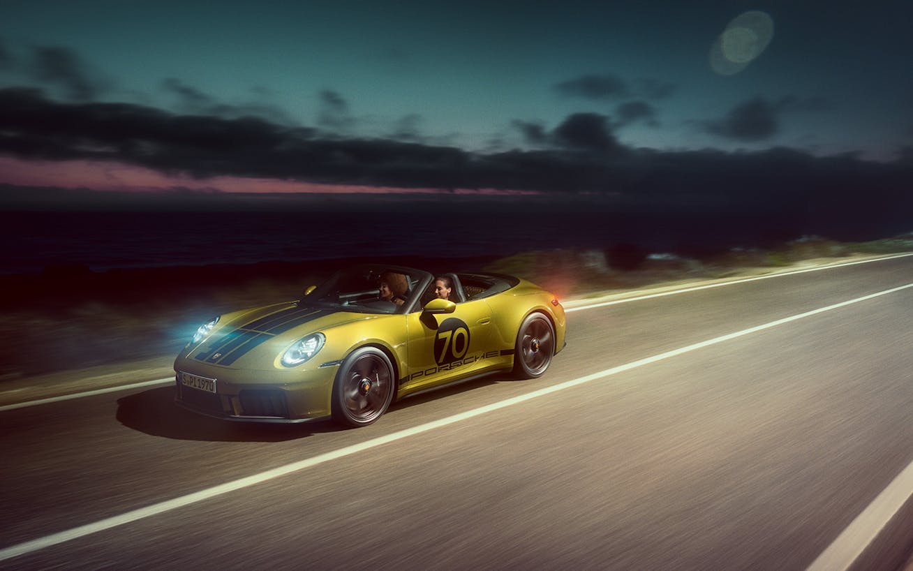 Porsche 911 Spirit 70 on open road at night