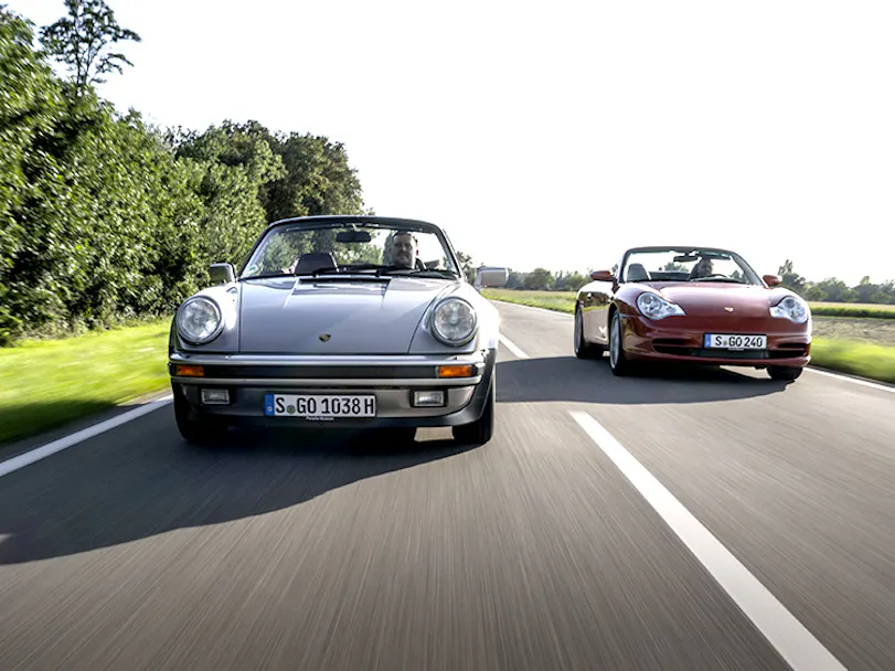 911 Carrera Cabriolet Turbolook_type 993_and 911 Carrera 4 Cabriolet_type 996_driving on open road_desktop mobile