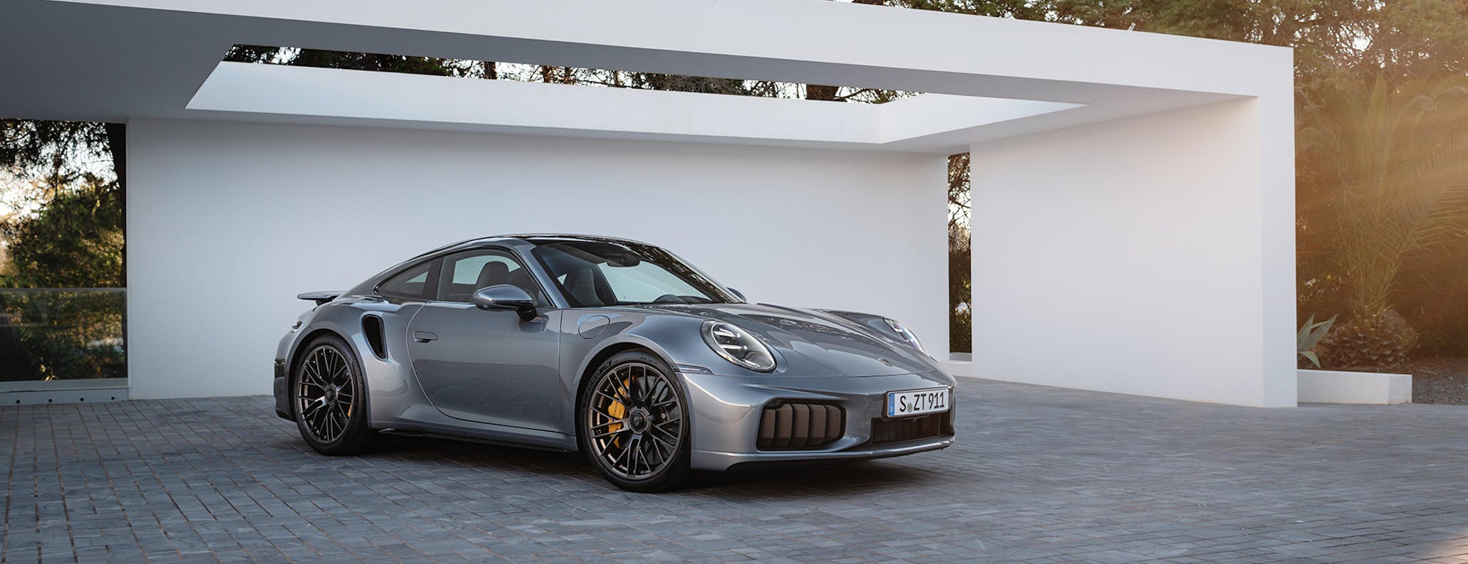 Porsche 911 Turbo S (type 992.2) in architect-designed car port