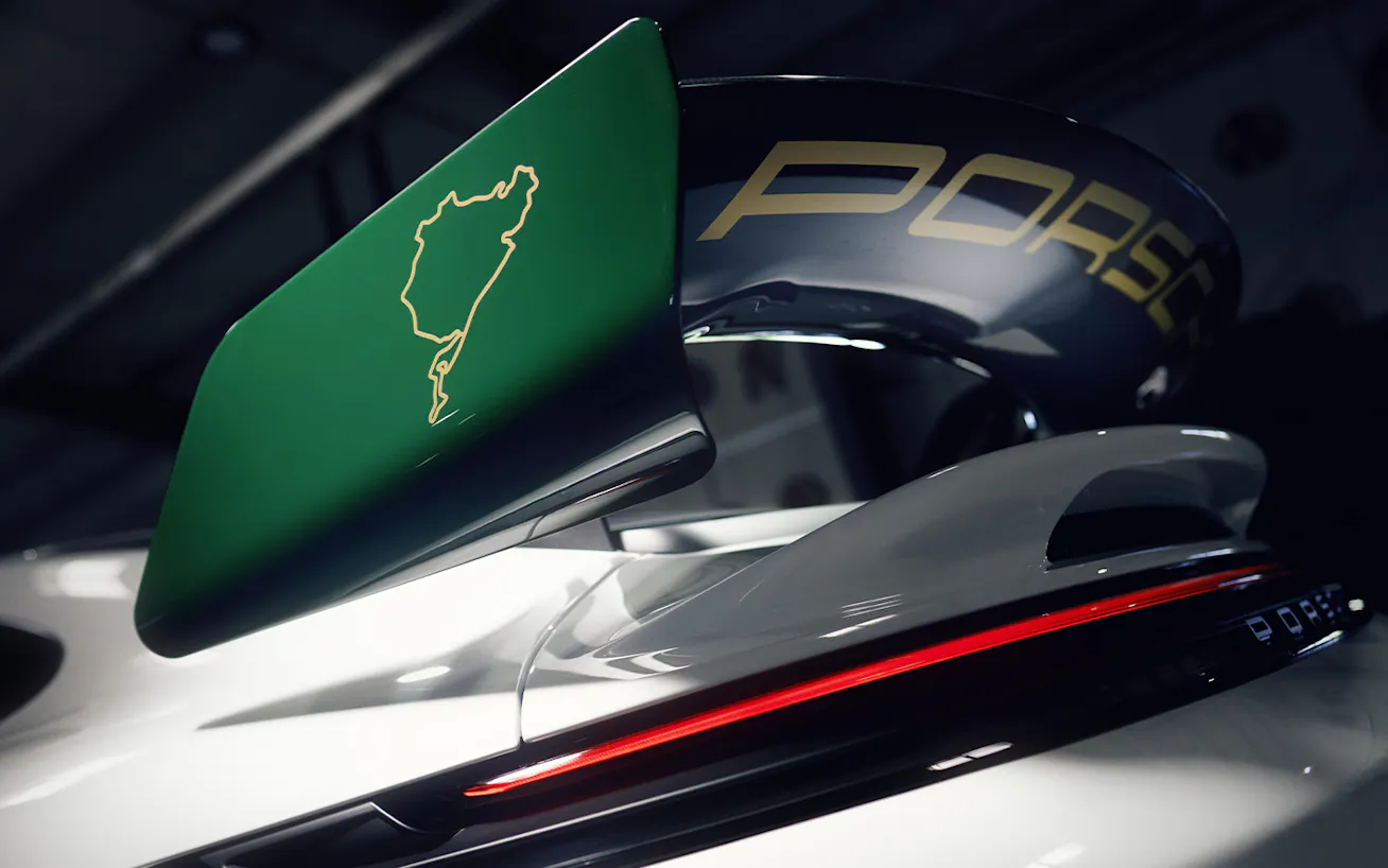 View of rear aero on Porsche 911 GT3 100 Jahre Nürburgring featuring a depiction of the layout of the Nürburgring circuit