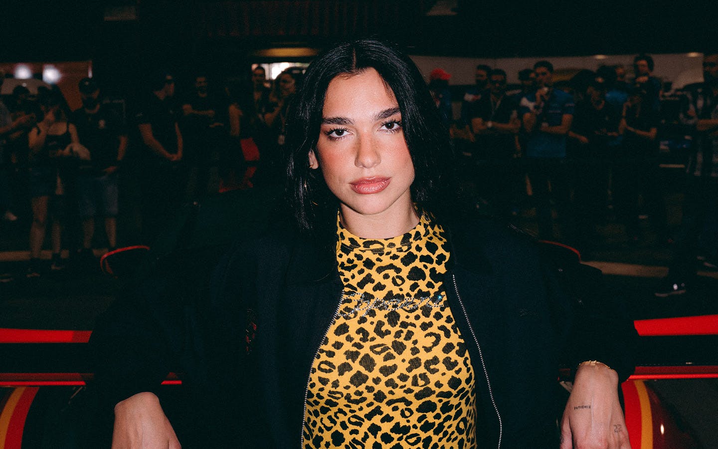 Dua Lipa leans on Dua Lipa Rennstall GT3 RS sportscar