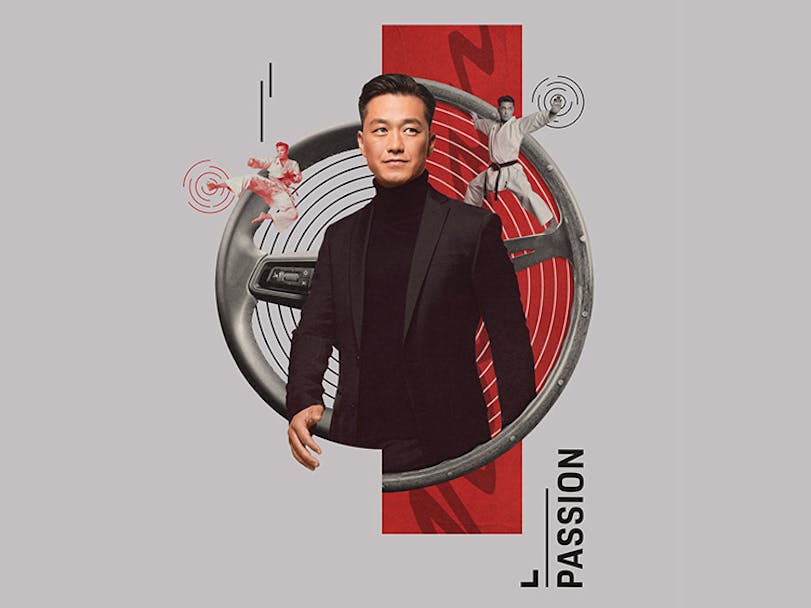 Composite image of a male Porsche worker with a Porsche steering wheel and person doing a karate move in the background