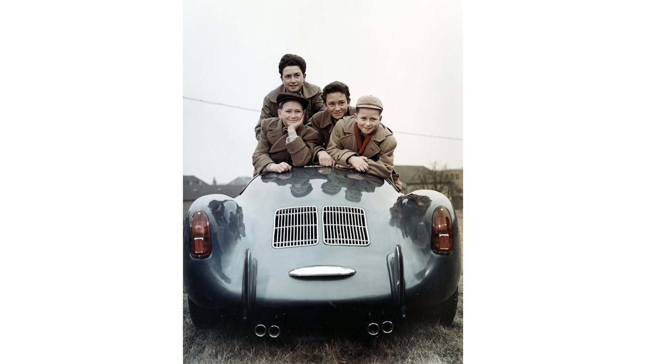 Four Porsche family brothers as boys in Porsche 550 Spyder