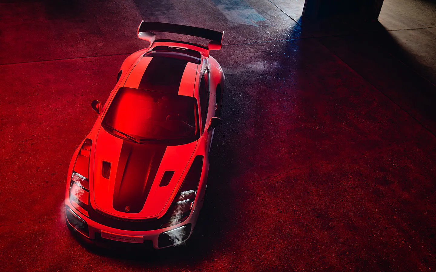 Porsche 911 Flachbau RS under dramatic red studio lighting