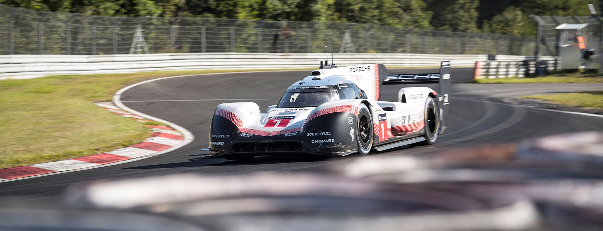 Porsche 919 Hybrid Evo driving on track at the Nürburgring