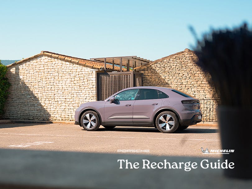 Porsche Macan Electric 4, traditional Provençal buildings behind