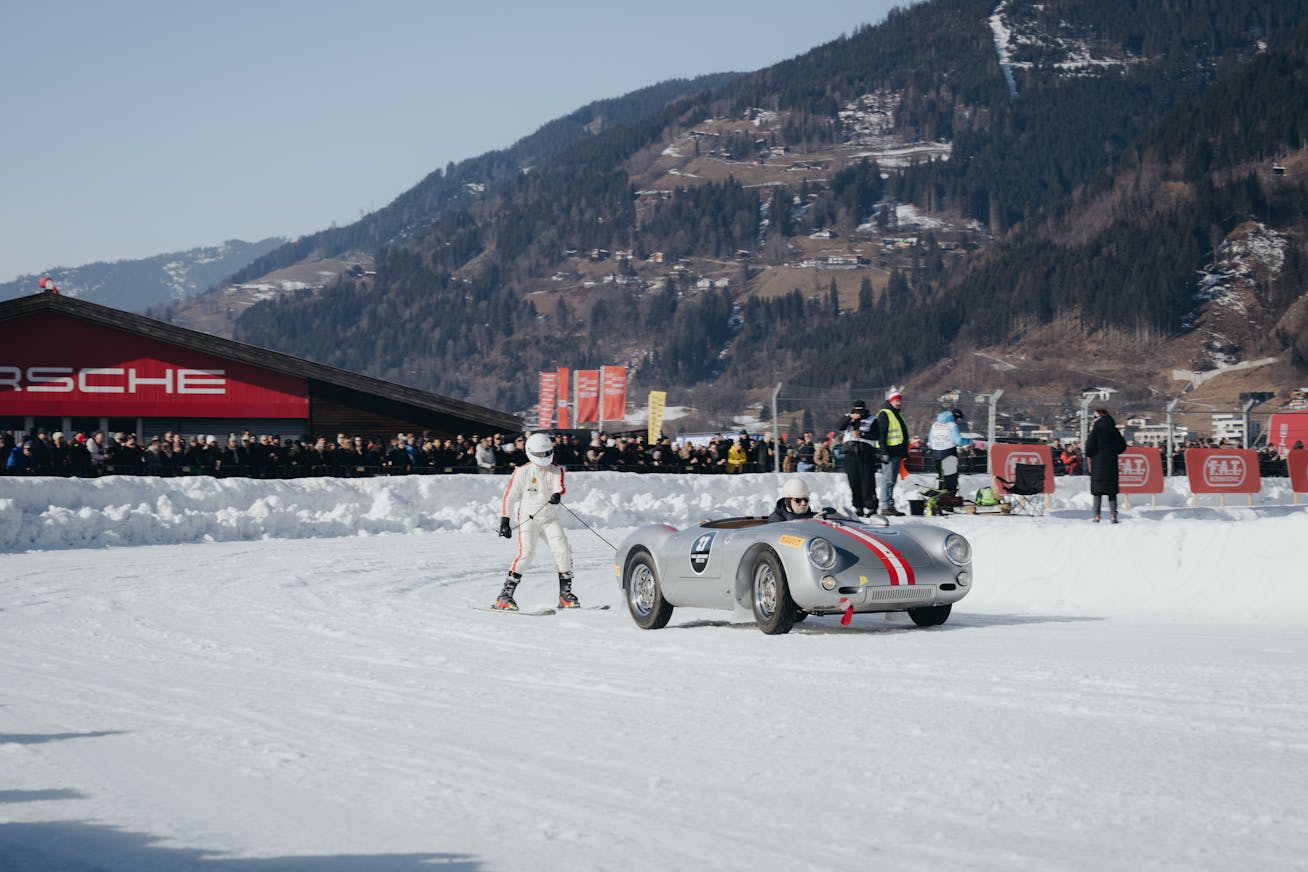 Porsche 550 Spyder tows a skier at the 2025 F.A.T. Ice Race