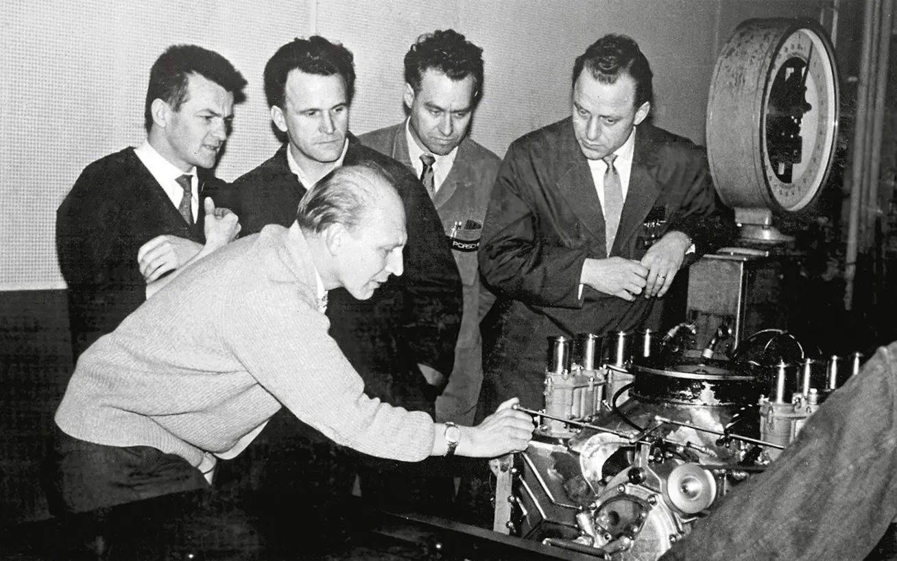 Hans Mezger and fellow engineers with the first-ever Porsche 753 Formula One engine 