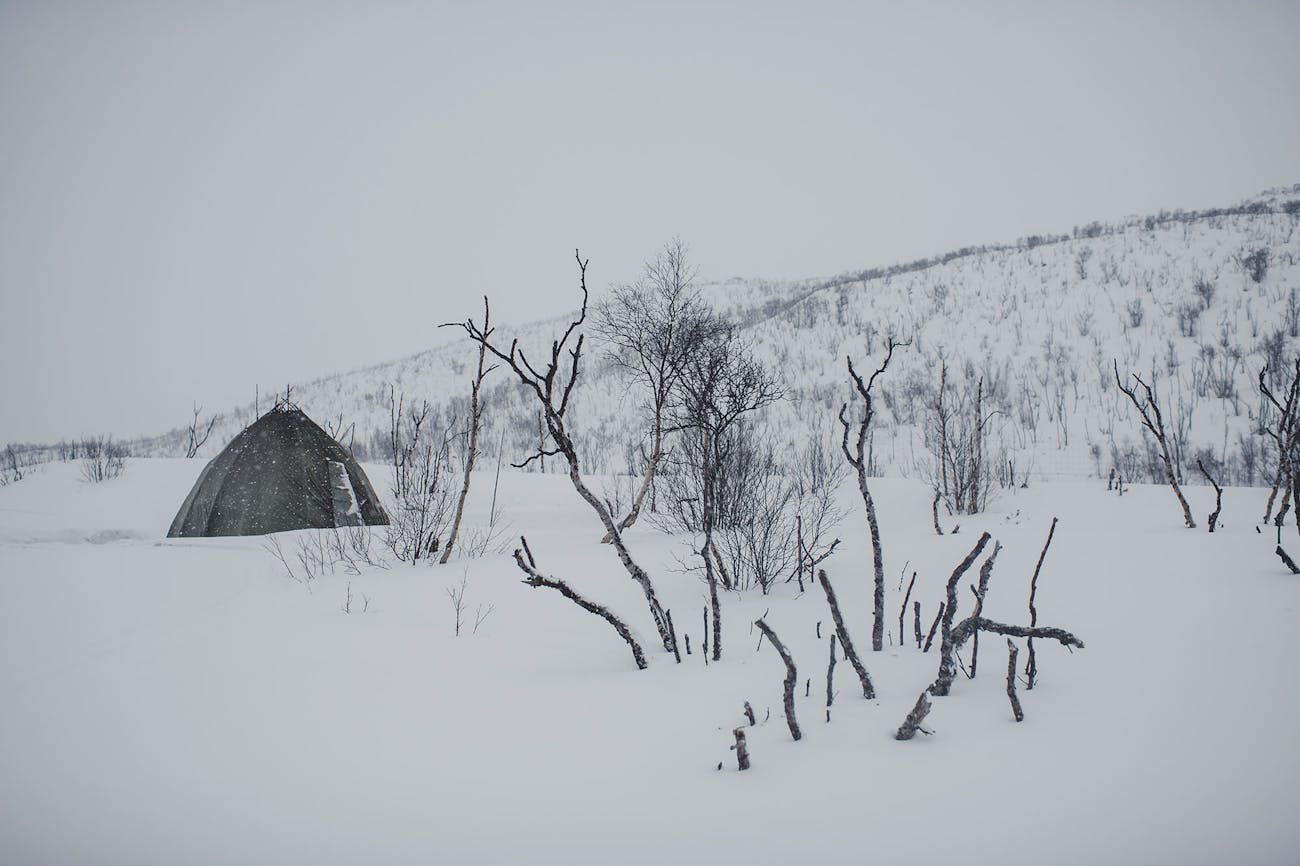 Outside of the lavvu in snowy landscape