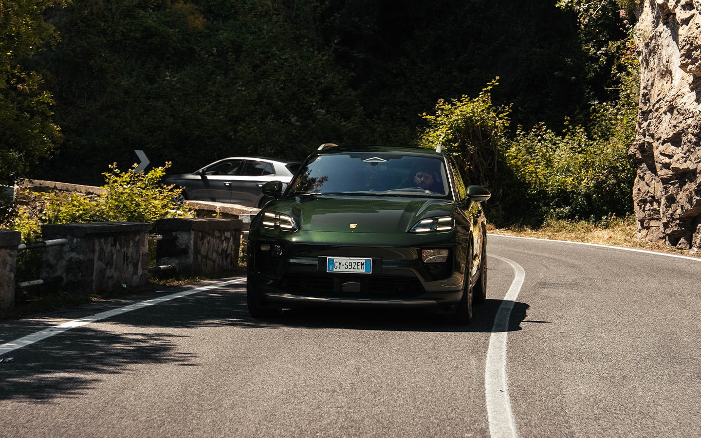 YouTuber Andres Vidoza driving Porsche Macan 4S Electric on road