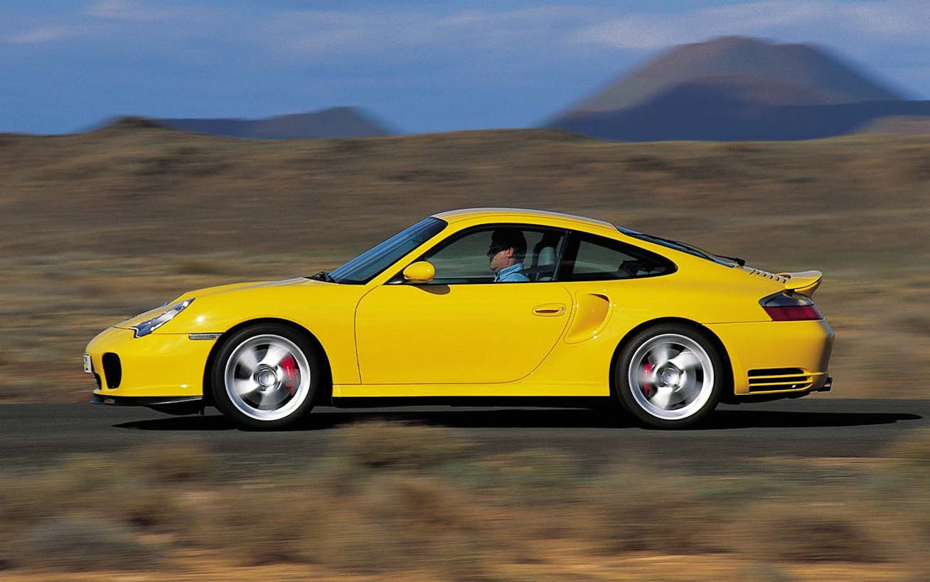 Side view of Porsche 911 Turbo (type 996) in Racing Yellow