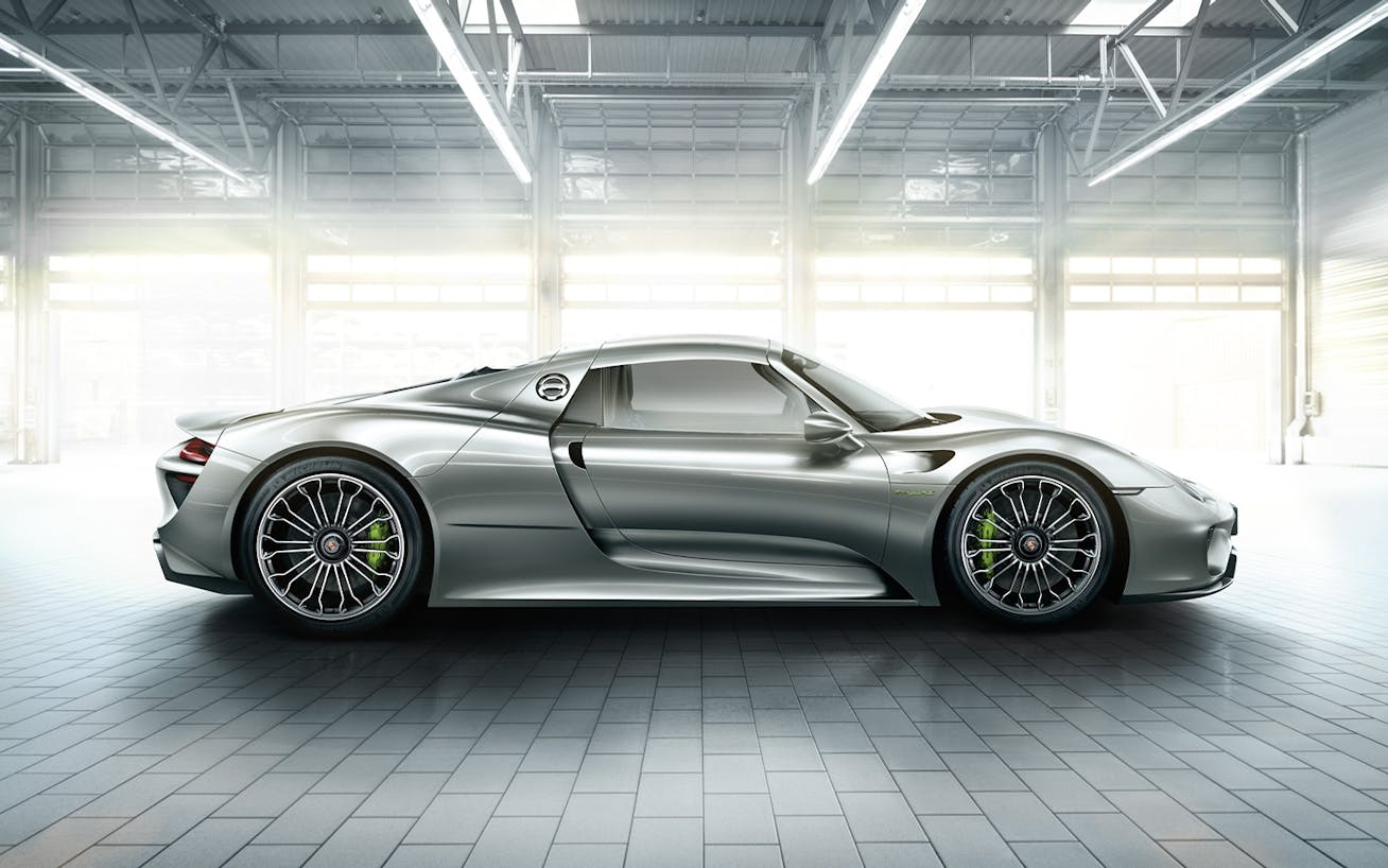 Porsche 918 Spyder inside brightly lit industrial building