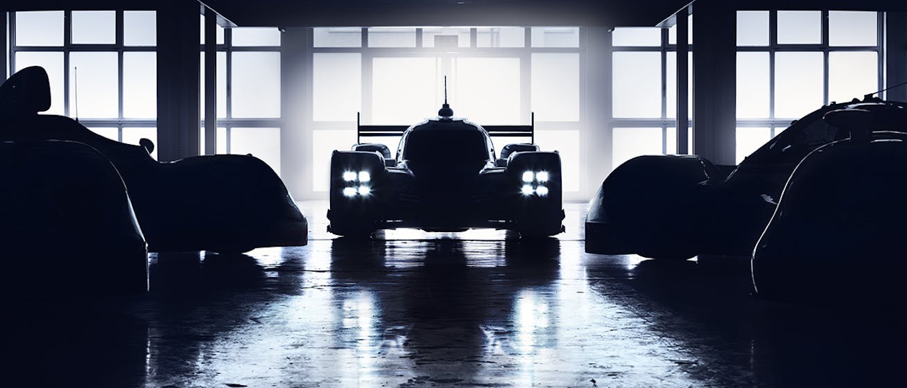 Porsche 919 Hybrid Evo racecar in silhouette