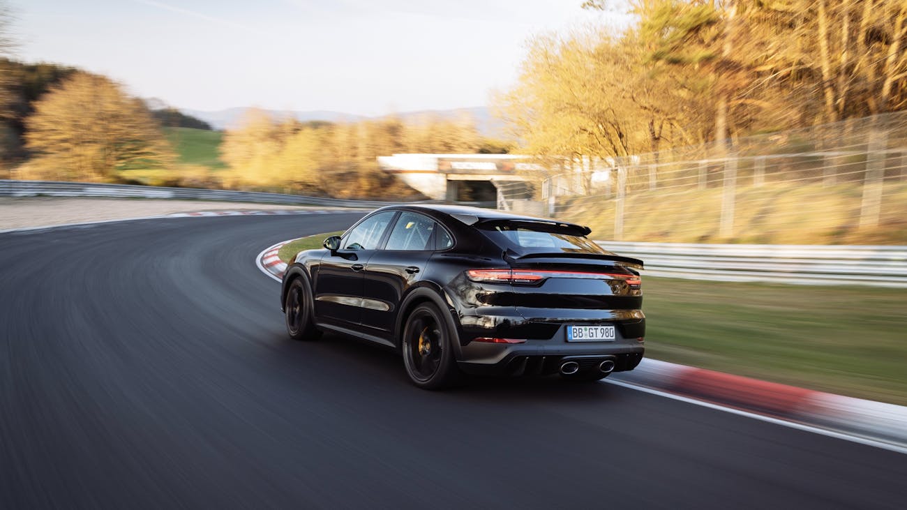 Rear view of new black Cayenne on track at Nürburgring