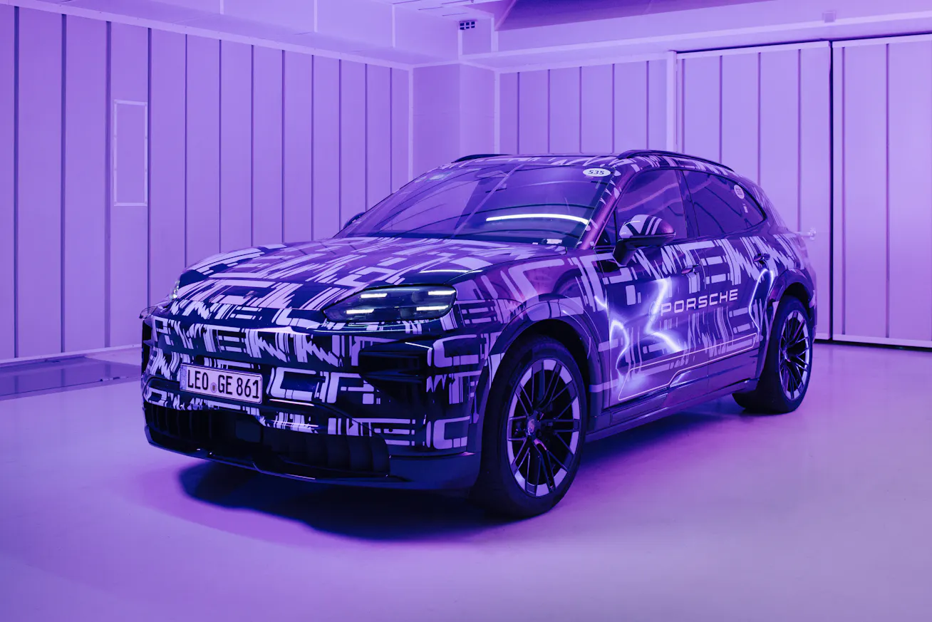 Studio image of new Porsche Cayenne Electric development car wearing wrap