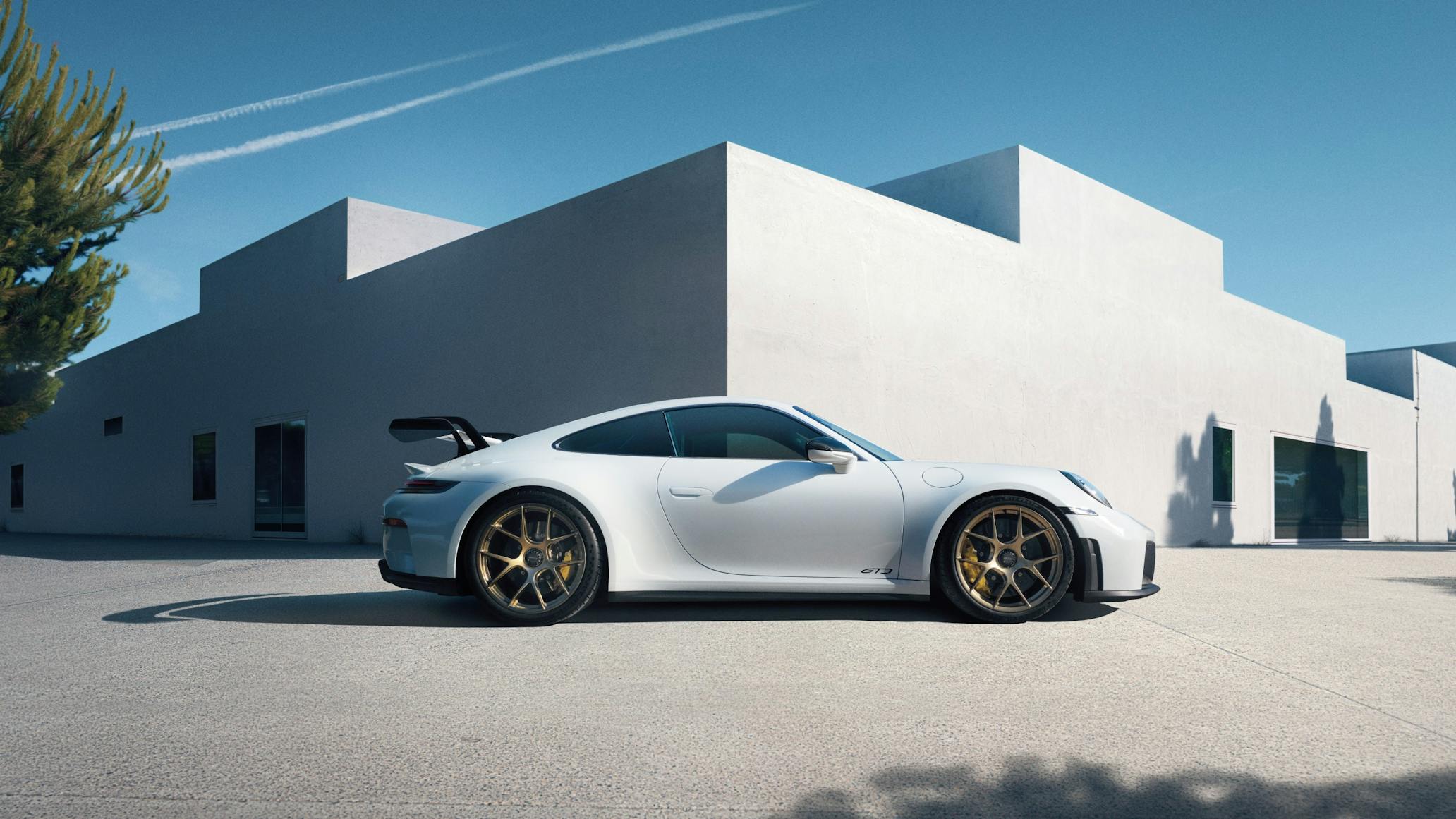 Side view of white 2025 Porsche 911 GT3