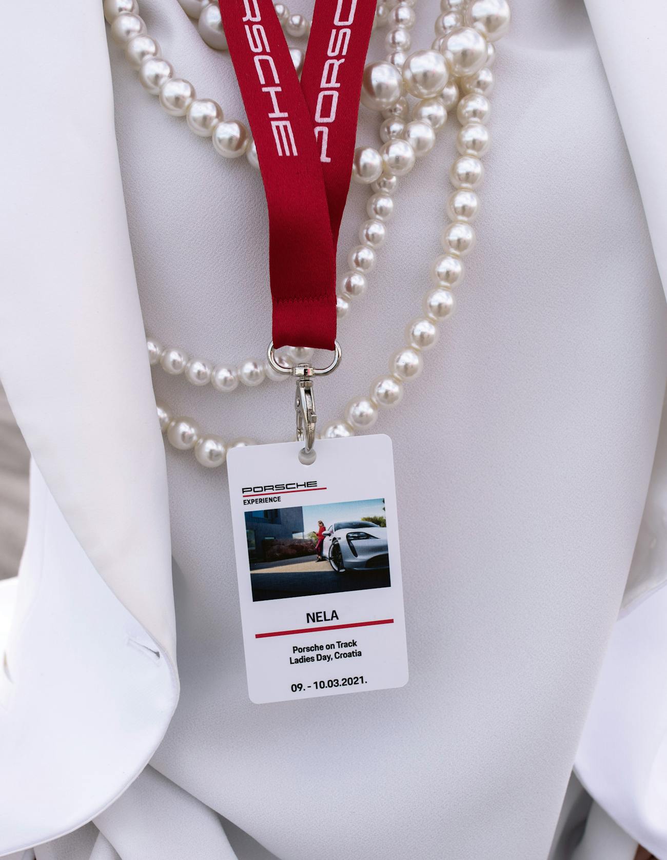 Lanyard around neck of participant at Porsche women-only trackday