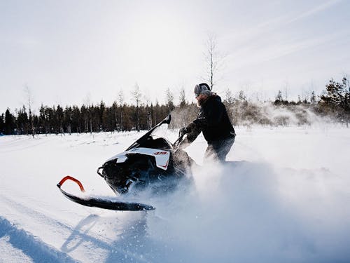 A man on a snowmobile in Finland