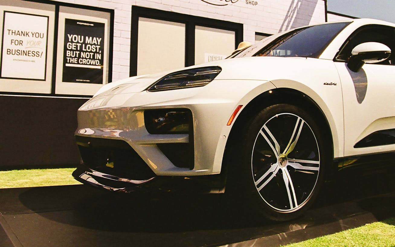 White Porsche Macan Turbo Electric at Monterey Car Week 