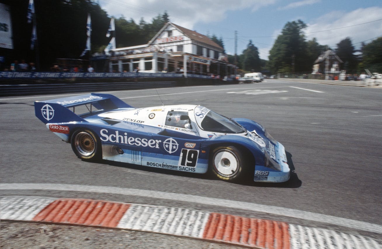 Porsche 956 B driving through La Source at Spa-Francorchamps circuit