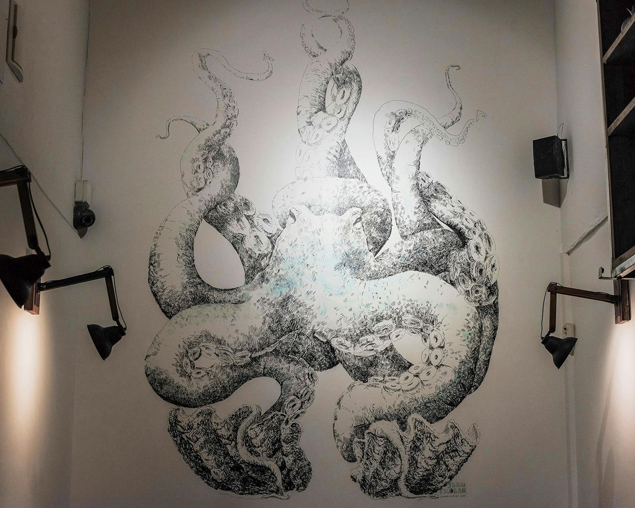 Modern wall mural of an octopus in a bar