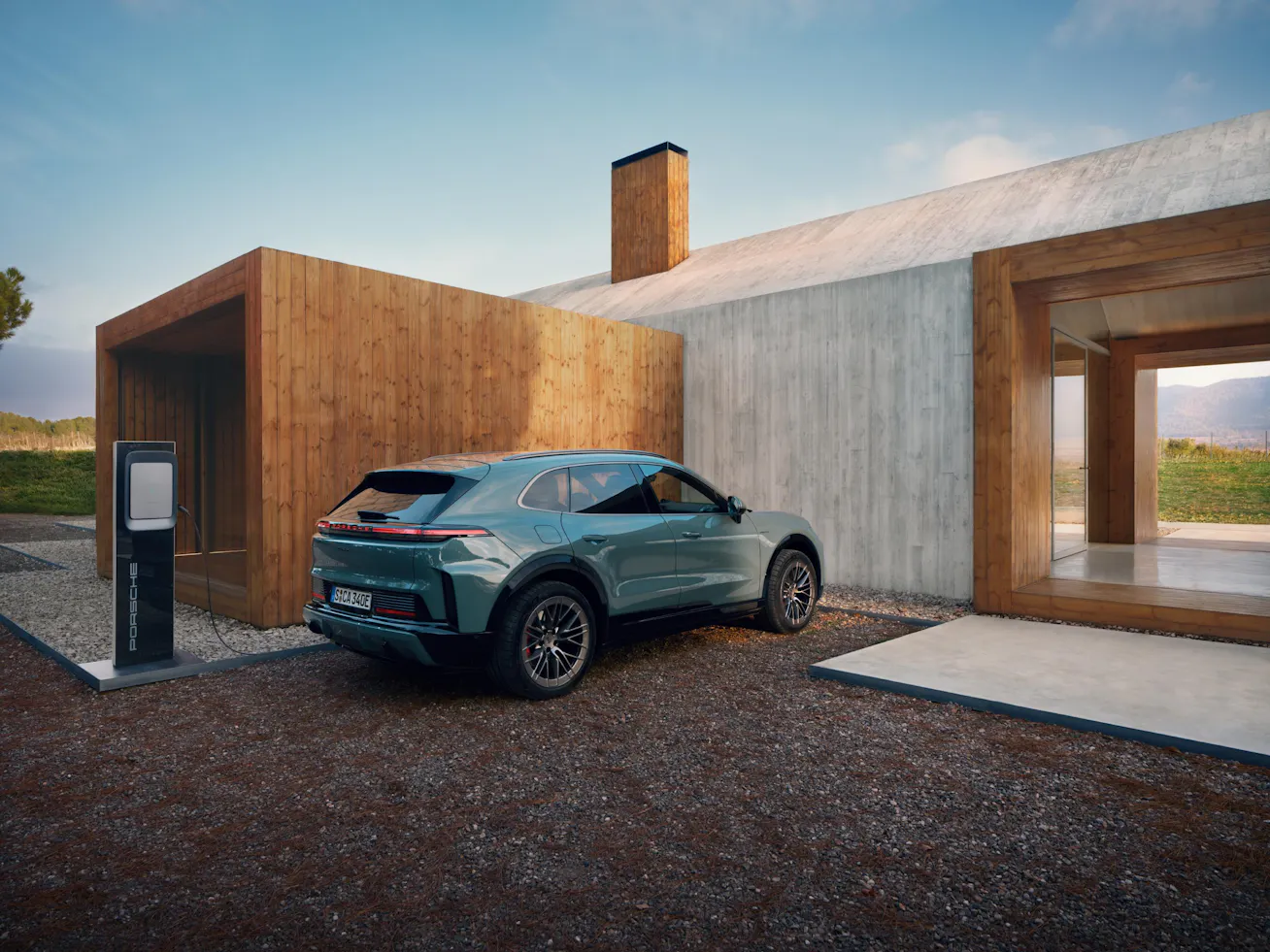 Porsche Cayenne Electric charging at modern house