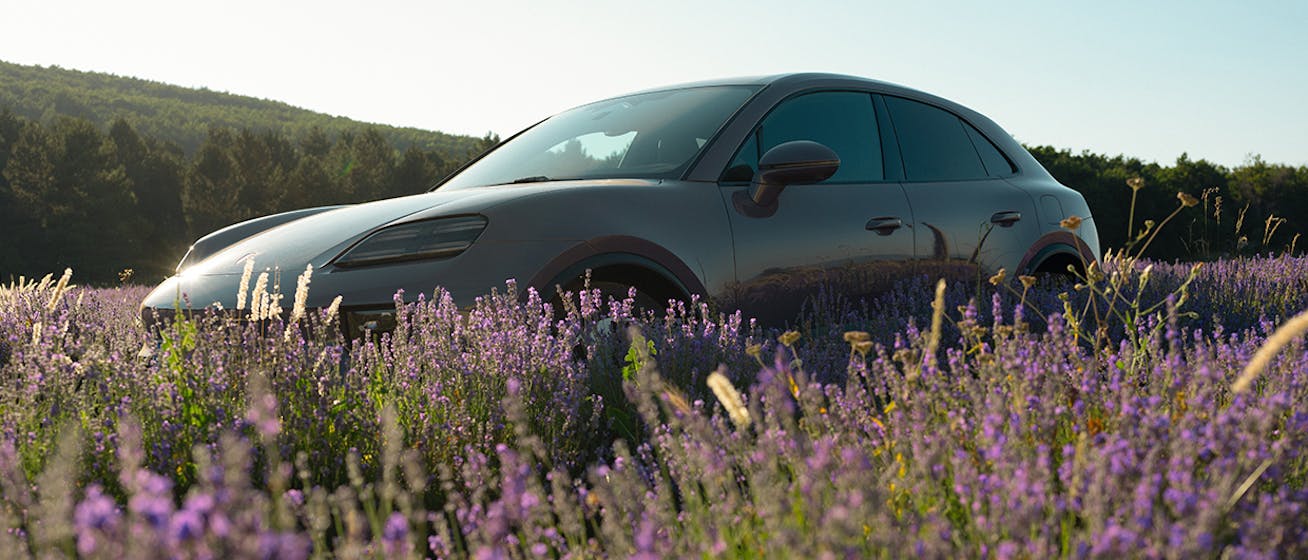 Porsche Macan Electric in field of lavender in Provence