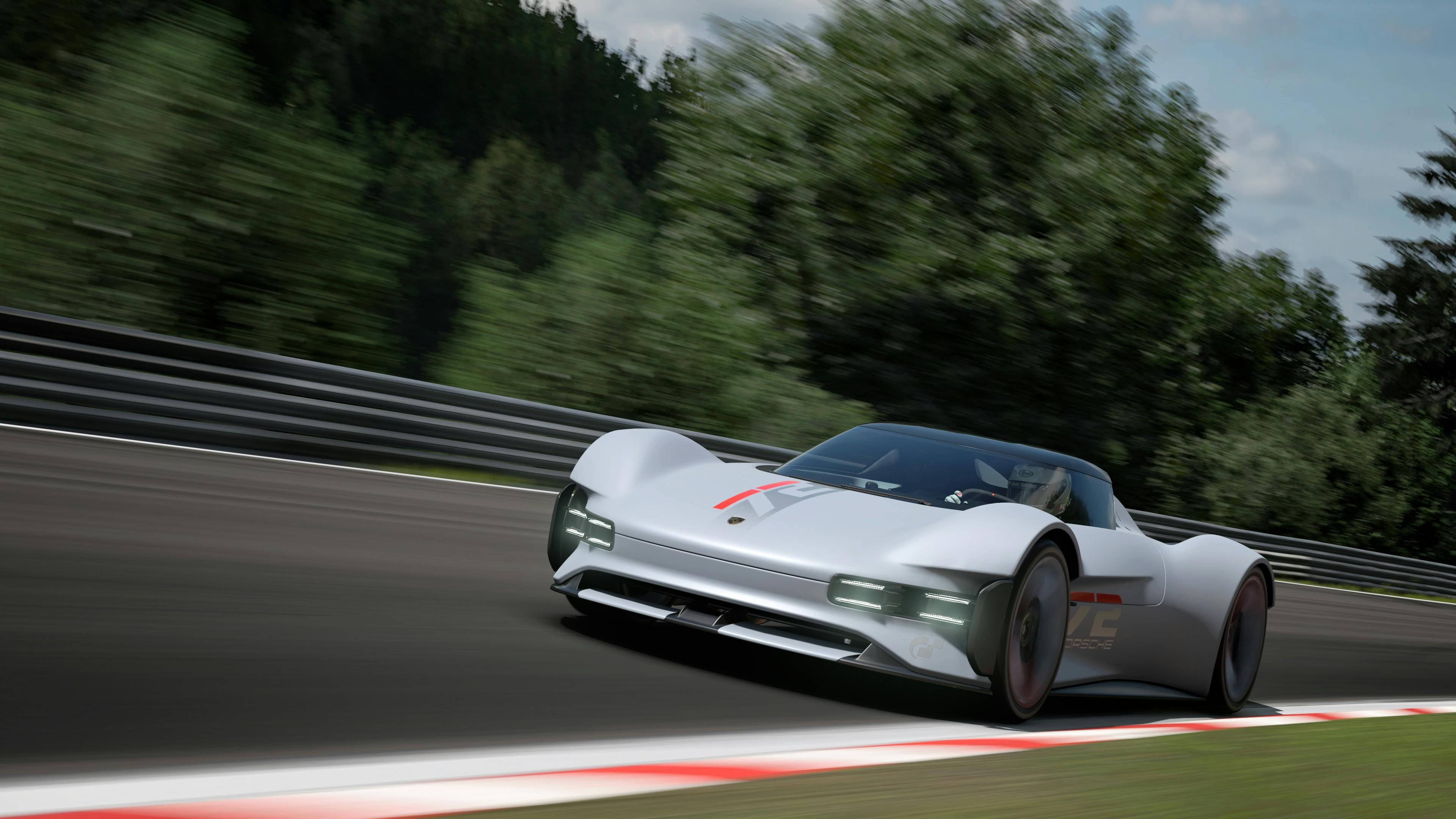 Front view of Porsche Vision GT from Gran Turismo driving on racetrack