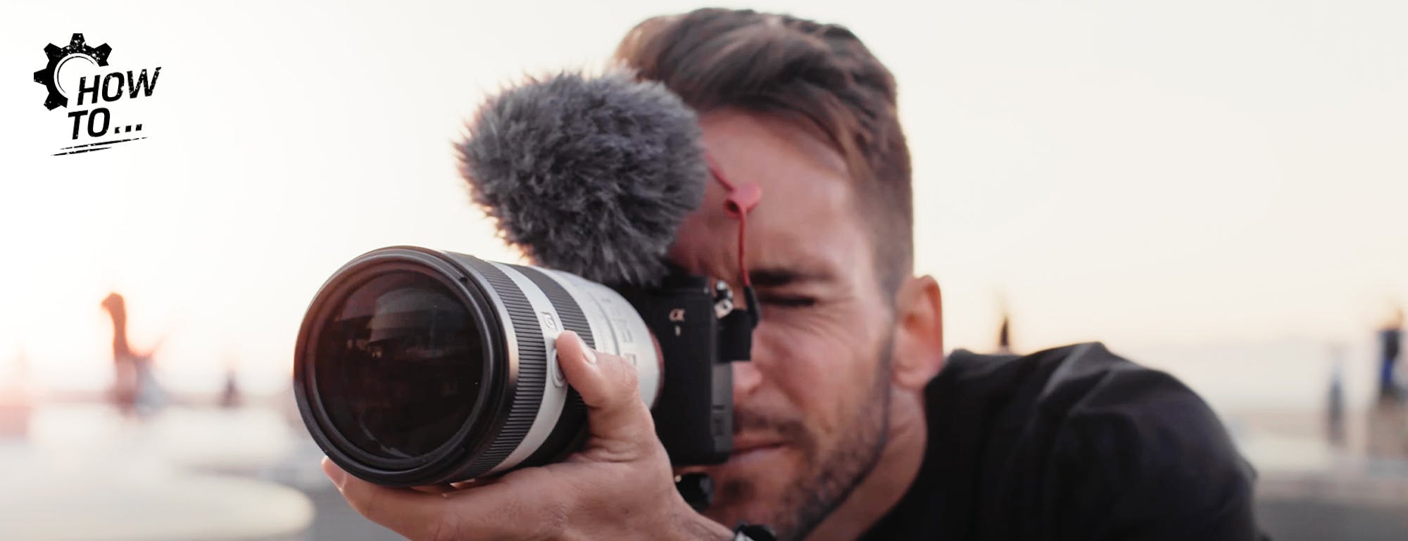 Close-up of man with camera and mic attachment