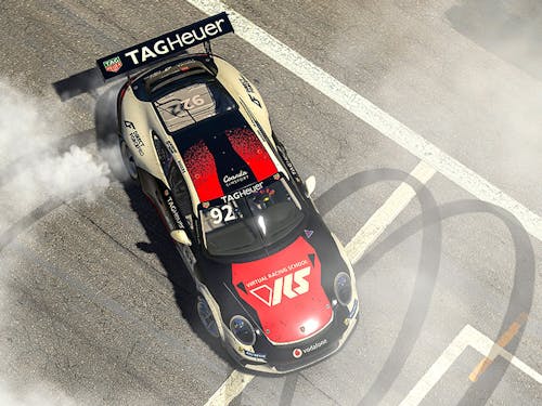 Porsche TAG Heuer Supercup car doing doughnuts on the track