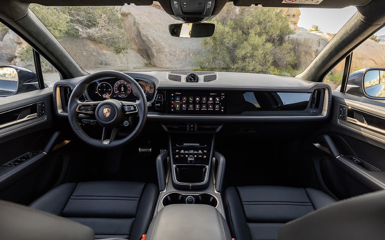 Porsche Cayenne interior showing cockpit, and driver and passengers displays