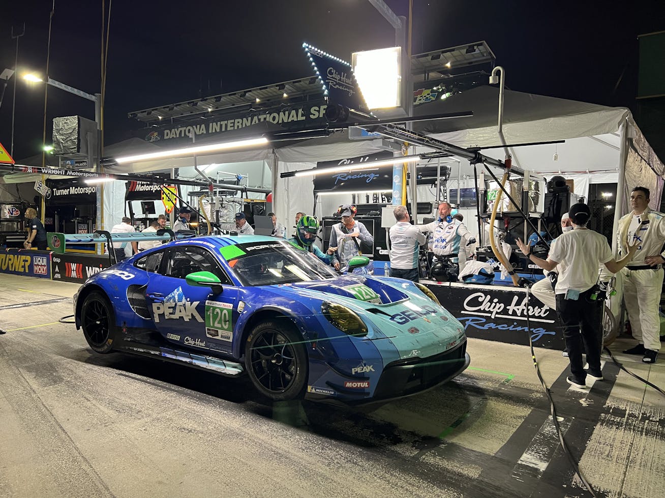 The Chip Hart Racing Porsche 911 GT3 R filming at Daytona
