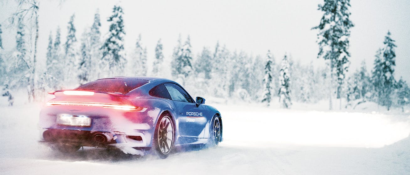 Porsche 911 Turbo S on snowy Arctic track