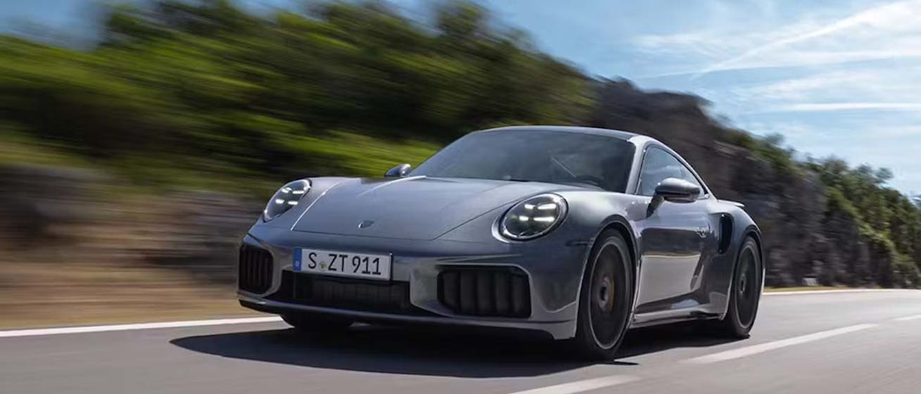 Porsche 911 Turbo S driving on open road