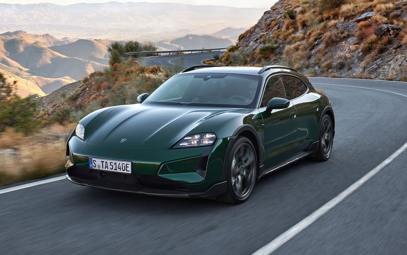 Porsche Taycan Turbo Cross Turismo driving on mountainous road