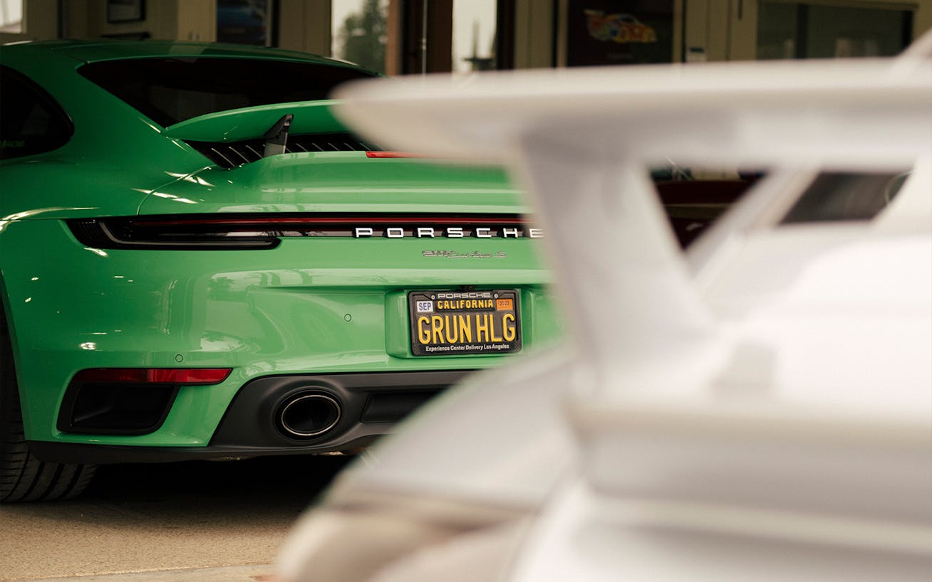 Rear view of 2021 992 Porsche Turbo S in Signal Green 