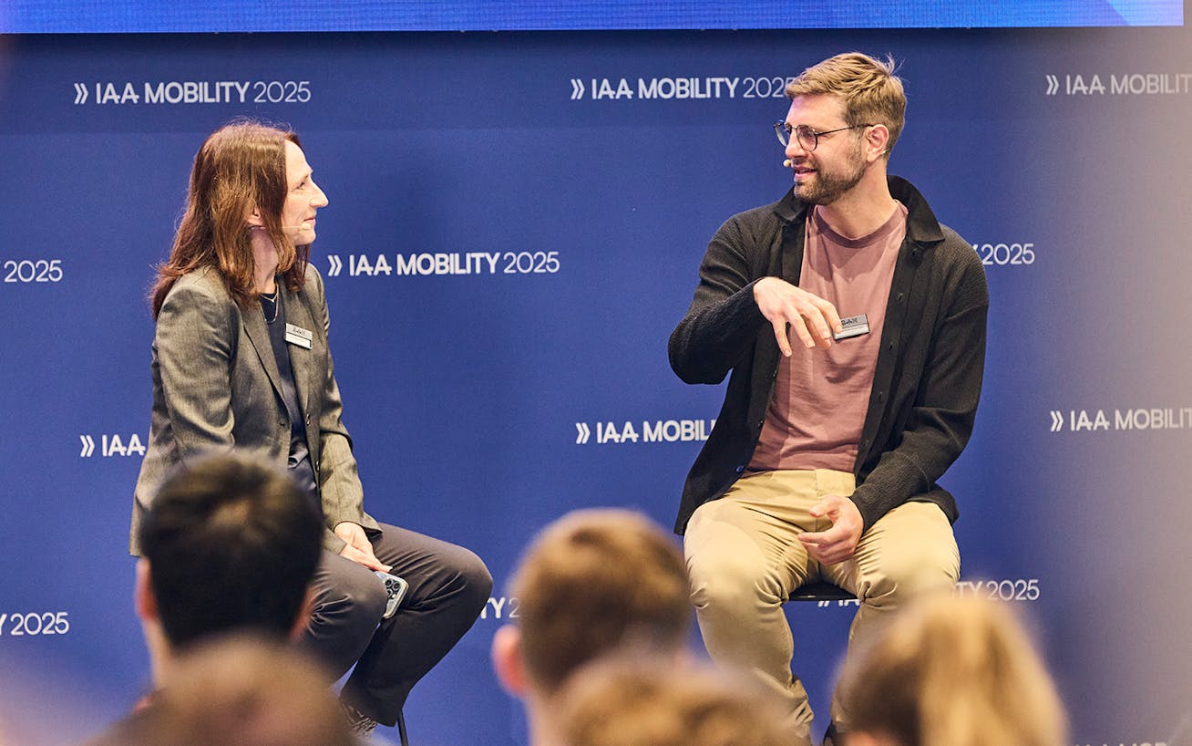 Tobias Grosse-Puppendahl, Porsche AI expert, talking at the 2025 IAA Mobility show in Munich