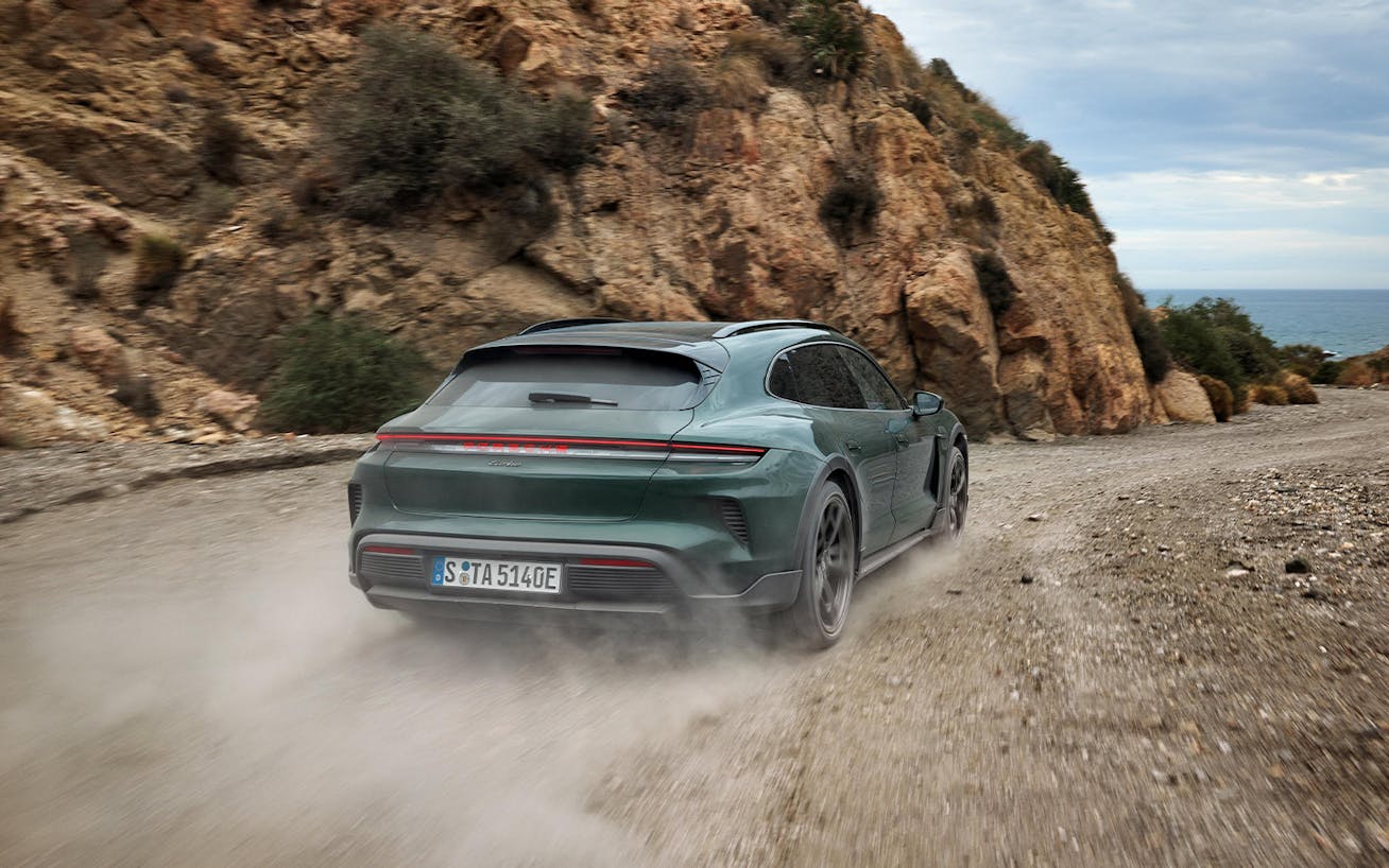 Porsche Taycan Turbo Cross Turismo on gravelly mountain road