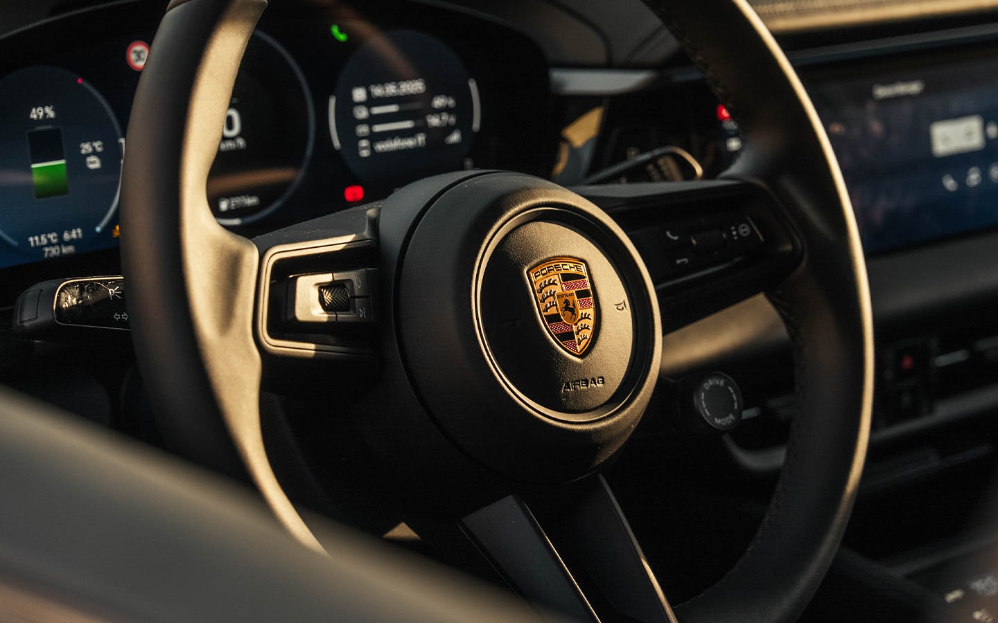 Close-up of steering wheel of Porsche Macan 4S Electric